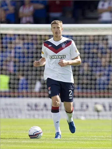 Dorin Goian Scores the Decisive Goal: Rangers Lead 2-0 Against Inverness Caledonian Thistle in the Scottish Premier League