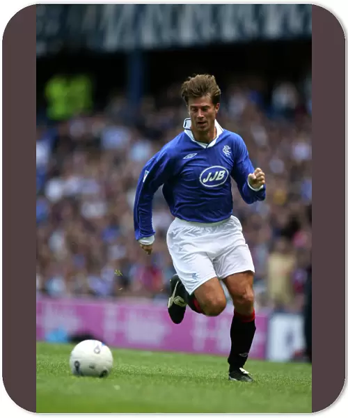 Celebrating Rangers Nine-in-a-Row: Brian Laudrup Leads Rangers Select vs Scottish League Select at Ibrox Anniversary Match
