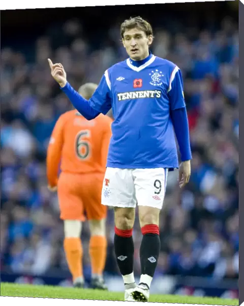 Rangers Nikica Jelavic Scores the Game-Winning Goal in a 3-1 Victory over Dundee United at Ibrox Stadium