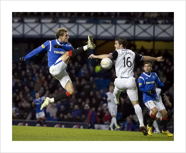 Jelavic vs. Golobart: A Clash of Titans in the Rangers vs. Inverness Clydesdale Bank Scottish Premier League Match at Ibrox Stadium (Rangers 2-1 Inverness CT)