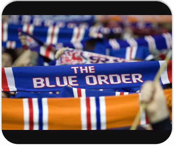 Triumphant Rangers Blue Order: A Sea of Scarves in Celebration at Ibrox Stadium (3-0 Victory over Motherwell)