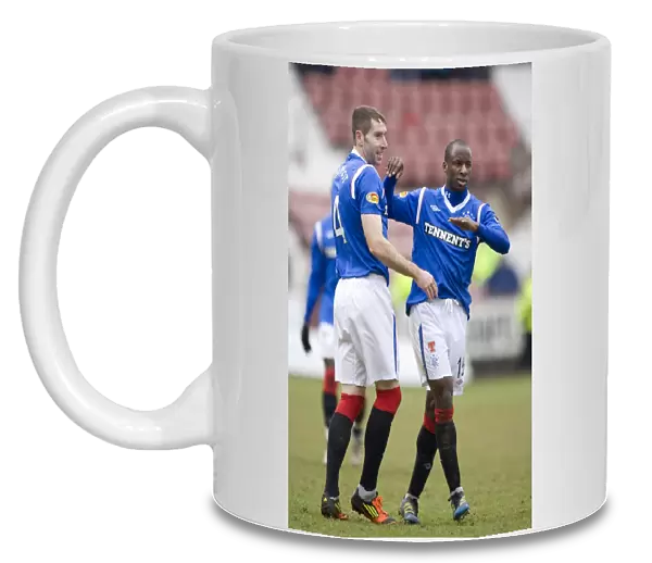 Sone Aluko's Stunner: Rangers 4-1 Domination Over Dunfermline in Clydesdale Bank Scottish Premier League
