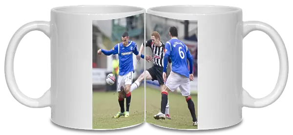 Mervan Celik vs. Ryan Thomson: A Clash in the Clydesdale Bank Scottish Premier League (4-1) - Dunfermline vs. Rangers