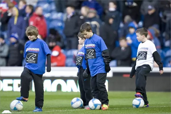 Half Time Rally: Rangers Soccer Schools Motivate Players Amidst 1-0 Deficit vs. Kilmarnock at Ibrox