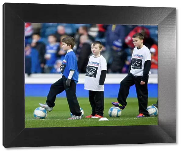 Rangers vs Kilmarnock: Half Time at Ibrox - Soccer Schools in Action Amidst a 1-0 Deficit