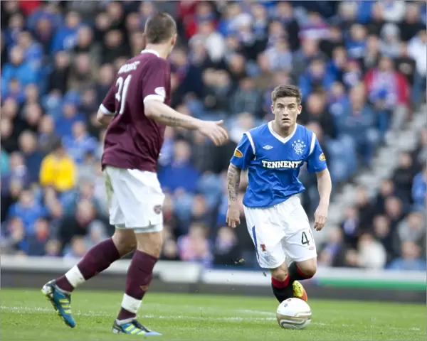 Rhys McCabe's Debut at Ibrox: Rangers Suffer 1-2 Defeat to Heart of Midlothian