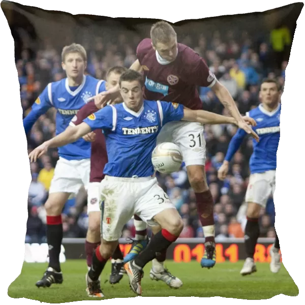 Rangers vs Hearts: A Tight Clash at Ibrox Stadium - Andy Little vs Adrian Mrowiec: A Pivotal Moment (1-2 in Favor of Hearts)