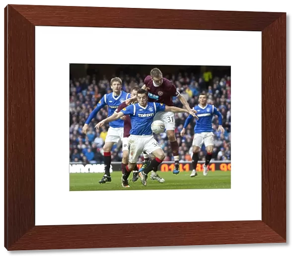 Rangers vs Hearts: A Tight Clash at Ibrox Stadium - Andy Little vs Adrian Mrowiec: A Pivotal Moment (1-2 in Favor of Hearts)