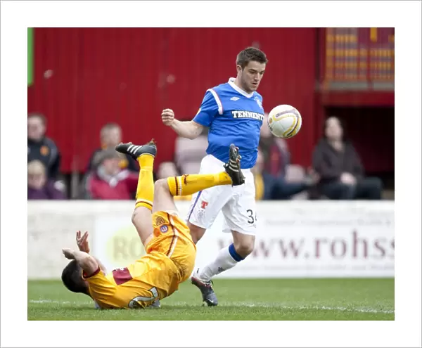 Andy Little Takes Charge: Rangers Victory over Motherwell in Scottish Premier League (1-2)