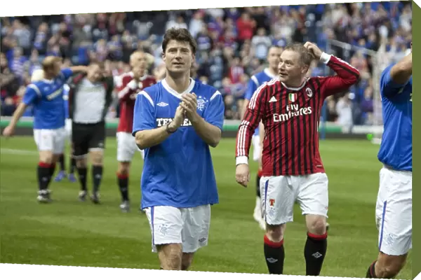 Triumphant Brian Laudrup: Rangers Legend Applauds Fans After Historic 1-0 Win Over AC Milan