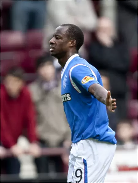 Rangers Sone Aluko Rejoices in His Game-Changing Goal: Hearts 0-3 Rangers (Clydesdale Bank Scottish Premier League, Tynecastle Stadium)