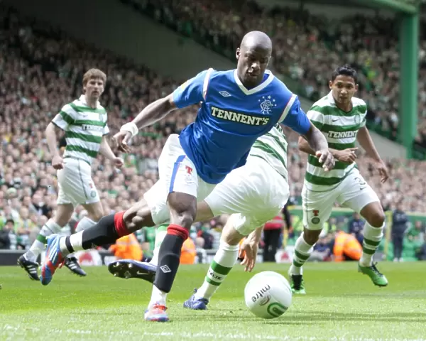 Sone Aluko Dodges Challenge: Rangers Uphill Battle Against Celtic's 3-0 Lead in the Scottish Premier League