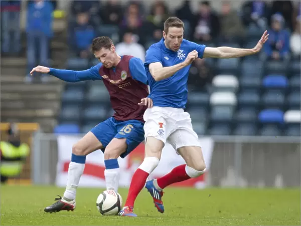 Rangers Kirk Broadfoot and Daryl Fordyce Clash as Rangers Take 2-0 Lead Over Linfield at Windsor Park