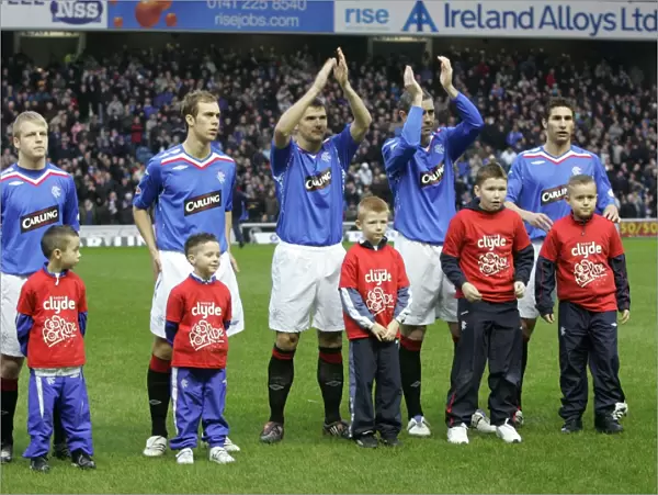 Clydesdale Bank Premier League: Thrilling 2-1 Rangers Victory over Heart of Midlothian - Cash for Kids Mascots Lead the Charge at Ibrox