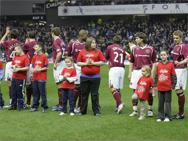 Rangers Football Club: Ibrox Mascots Celebrate 2-1 Victory over Heart of Midlothian for Cash for Kids