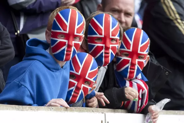 Rangers Fans in Masks: 4-0 Victory Celebration at McDiarmid Park against St. Johnstone (Scottish Premier League)
