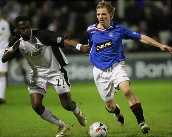 Chris Burke Scores the Winning Goal Against Abdul Osman and Gretna in Rangers 2-1 Victory at Fir Park
