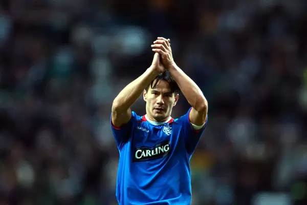 Michael Mols Applauds Rangers Fans: A Historic Moment after Defeating Celtic in Premier Division Soccer Match