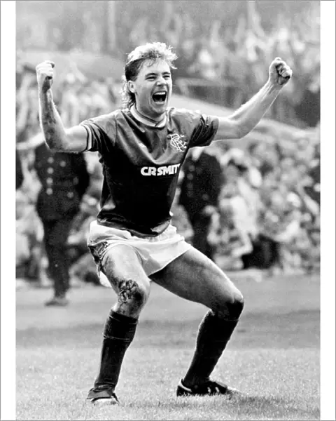 Ally McCoist's Historic Double: Securing Rangers Premier Division Title with a 3-0 Triumph over Heart of Midlothian