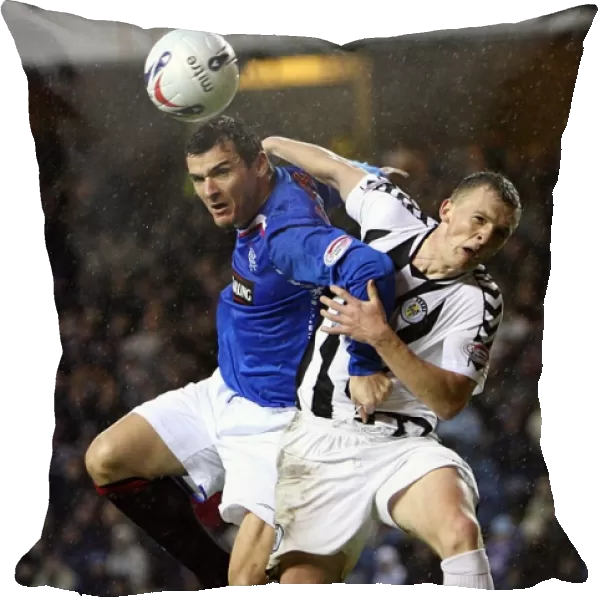 Intense Rivalry: Rangers vs St Mirren - A Battle for the Ball Results in a 4-0 Ibrox Victory