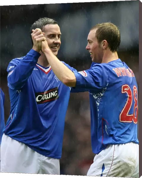 Rangers Steven Whittaker and David Weir: A Jubilant Moment after Rangers 4-0 Victory over St Mirren at Ibrox - Whittaker's Goal Celebration with Weir