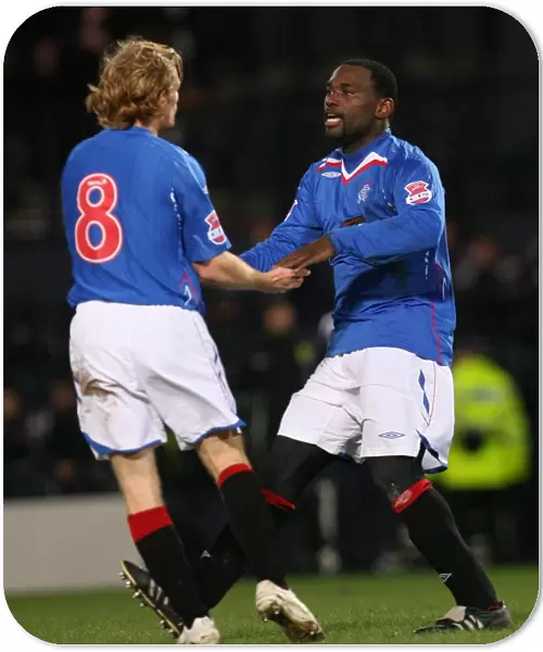 Rangers Darcheville and Burke: Celebrating a 2-0 Lead Over Heart of Midlothian in the CIS Insurance Cup Semi-Final at Hampden Park