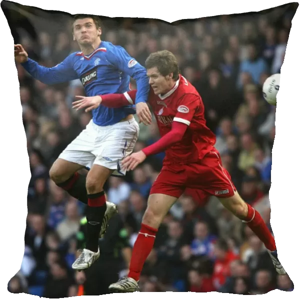 Intense Rivalry: Barr vs McCulloch - Rangers 2-0 Victory over Falkirk at Ibrox (Clydesdale Bank Premier League)