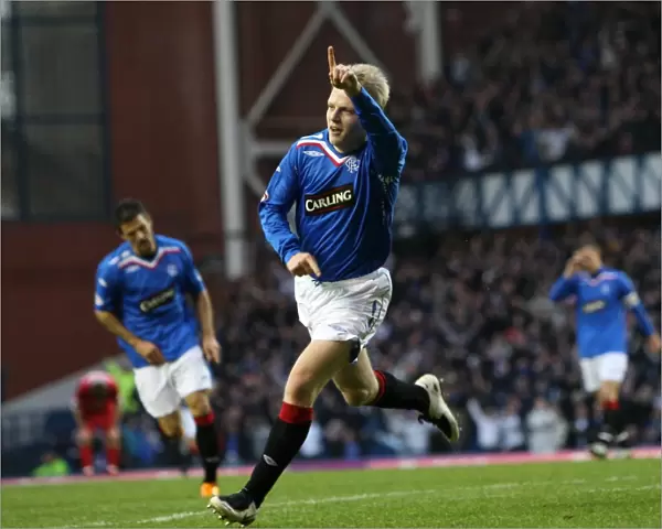 Naismith's Decisive Strike: Rangers 2-0 Victory Over Falkirk in the Clydesdale Bank Premier League at Ibrox