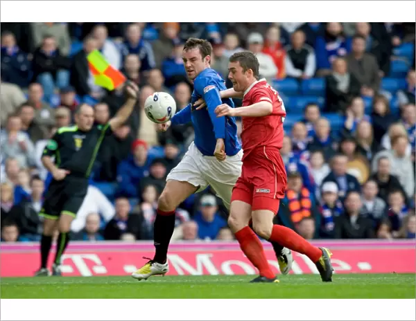 Kris Boyd Scores the Decisive Goal: Rangers 2-0 Win Over Falkirk (Scottish Premier League)