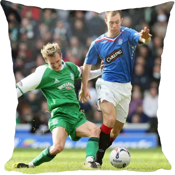 Intense Rivalry: Rangers vs Hibernian's Battle for the Ball in the Scottish Cup Fifth Round Replay at Ibrox (1-0)