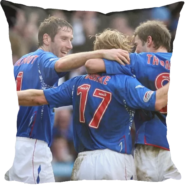 Rangers Football Club: Kirk Broadfoot, Kevin Thompson, and Chris Burke Celebrate First Goal in Scottish Cup Fifth Round Replay vs Hibernian at Ibrox