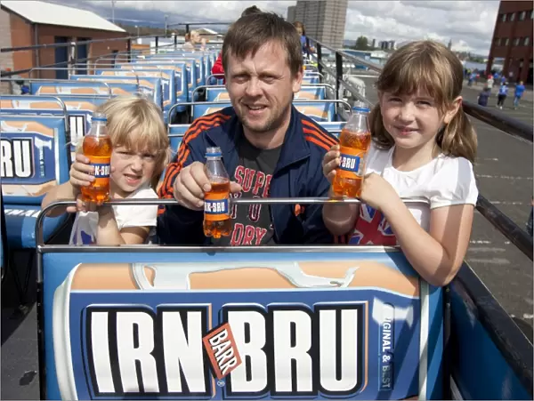 Rangers Football Club: Billy McAndrew and Daughters Jubilant Moment on the Irn Bru Bus after a 5-1 Victory over East Stirlingshire at Ibrox Stadium