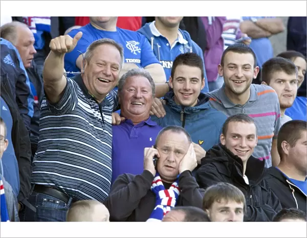Rangers FC's Blue and White Sea at Falkirk Stadium: A 1-0 Victory (Ramsden's Cup Second Round)