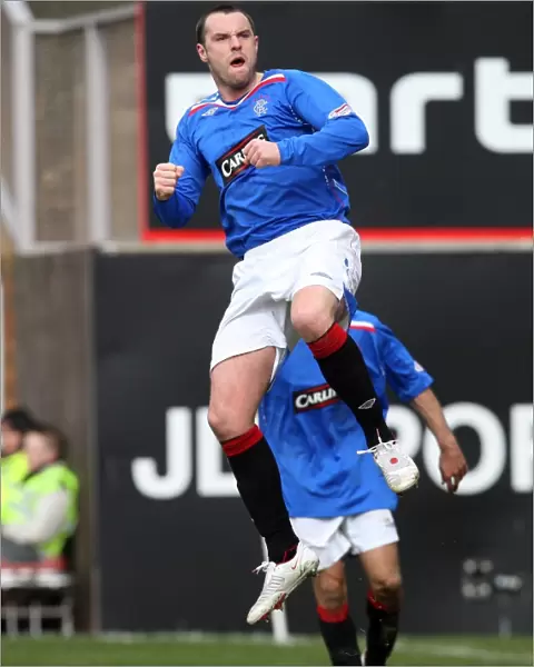 Thrilling Tussle at Tannadice: Kris Boyd's Hat-Trick Saves Rangers a Point (3-3)