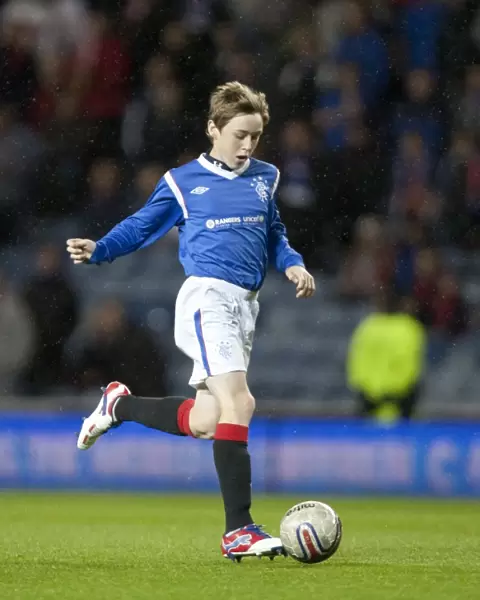 Half Time Penalty Showdown at Ibrox: Rangers vs Queen of the South - 2-2 Deadlock