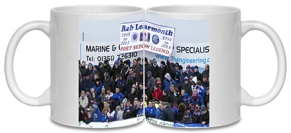 Rangers Fans Honor Rab Learmonth at Balmoor Stadium: A Moment of Silence During Peterhead vs Rangers (0-1)