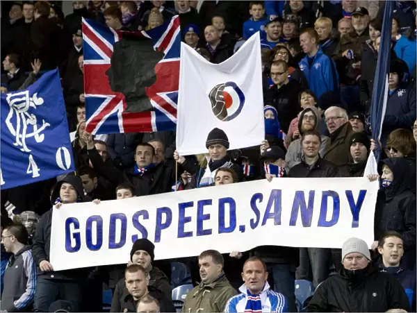 Rangers Fans United: A Sea of Scarves in Tribute to Sandy Jardine at Ibrox Stadium
