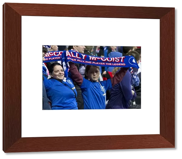 Ecstatic Rangers Fans in Scarves: Celebrating a 4-0 Victory at Ibrox Stadium