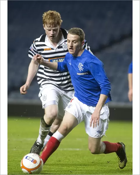Tom Walsh's Brilliant Performance: Rangers Reserves Lead 2-0 Against Queens Park Reserves at Ibrox Stadium