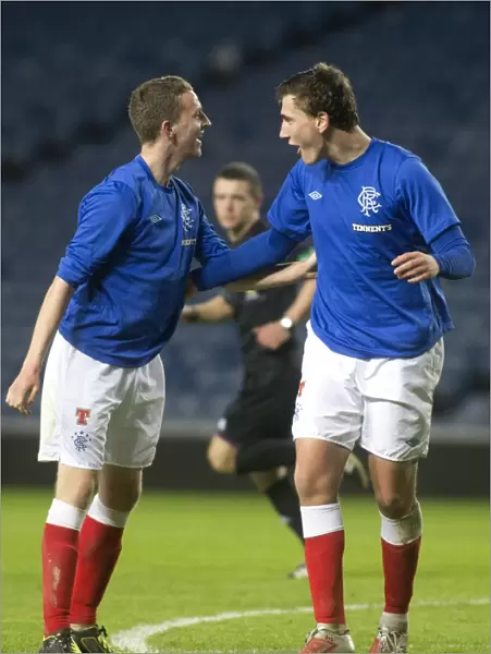 Rangers Tom Walsh and Luca Gasparotto Celebrate 2-0 Lead over Queens Park Reserves