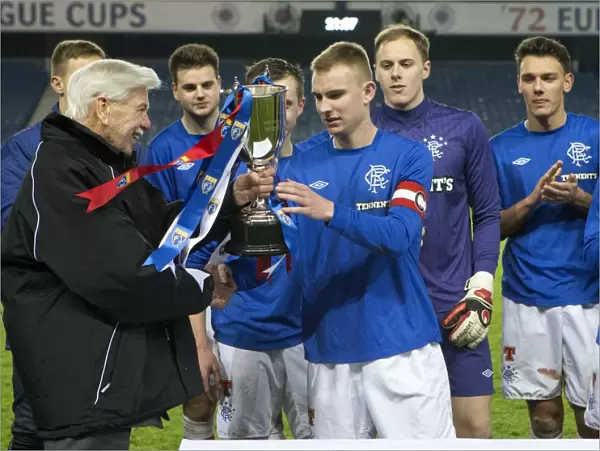 Rangers Reserves Clinch SFL Reserve League Title: Andy Mitchell Receives the Trophy from Lord McFarlane at Ibrox Stadium