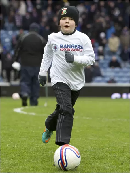 Half-Time Takeover: A Sea of Excitement and Joy as Rangers Kids Invade the Ibrox Pitch