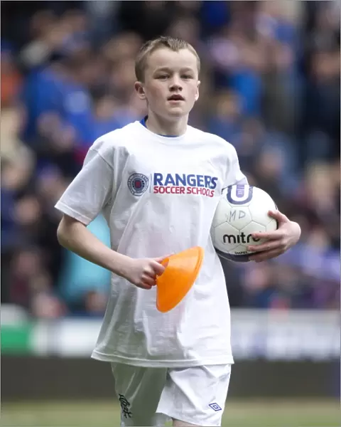 Young Rangers Shine: Memorable Half Time Experience - Future Stars Grace Ibrox's Hallowed Turf: Rangers Soccer School Kids Play on the Pitch
