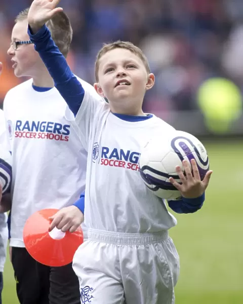 Young Rangers Shine: Third Division Soccer School Kids Play at Ibrox during Rangers 2-0 Victory over Clyde