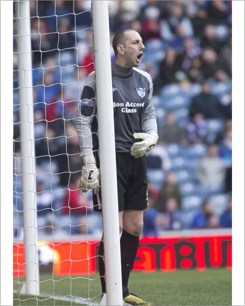 Upset at Ibrox: Peterhead's 1-2 Victory Over Rangers (Graeme Smith Stands Victorious)