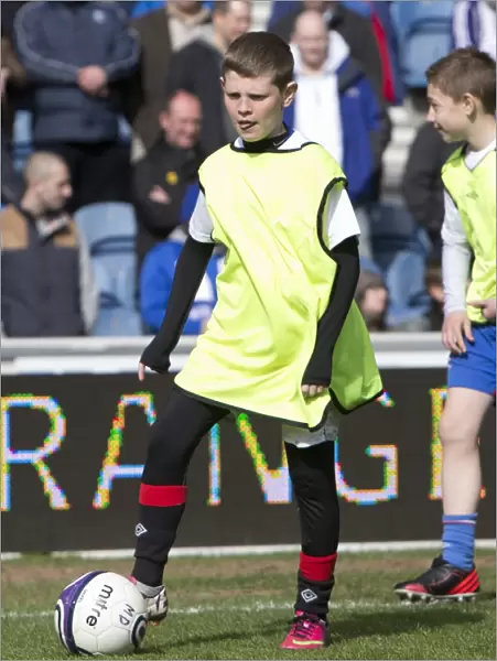 Rangers Soccer School Kids Bring Half-Time Entertainment to Ibrox: A Delightful Moment Amidst Rangers vs. Peterhead's Scottish Third Division Match
