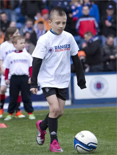 Rangers Soccer School Kids Delight Ibrox Fans with Exciting Half-Time Entertainment: Rangers vs. Peterhead (1-2)