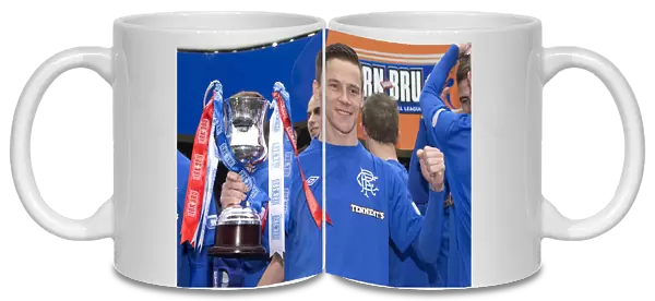 Rangers Football Club: Ian Black Celebrates Promotion to Third Division with Irn Bru Trophy Lift at Ibrox Stadium