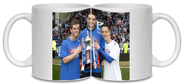 Rangers Football Club: Celebrating Promotion to Scottish Third Division with the Irn Bru Trophy - A Historic 1-0 Victory over Berwick Rangers at Ibrox Stadium
