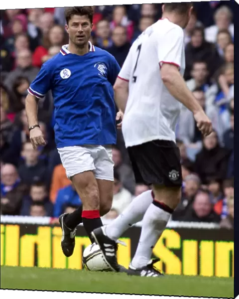 A Classic Clash: Rangers Legends vs Manchester United Legends - Brian Laudrup in Action at Ibrox Stadium